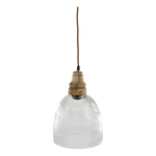 fluted glass pendant light with wooden top against transparent background