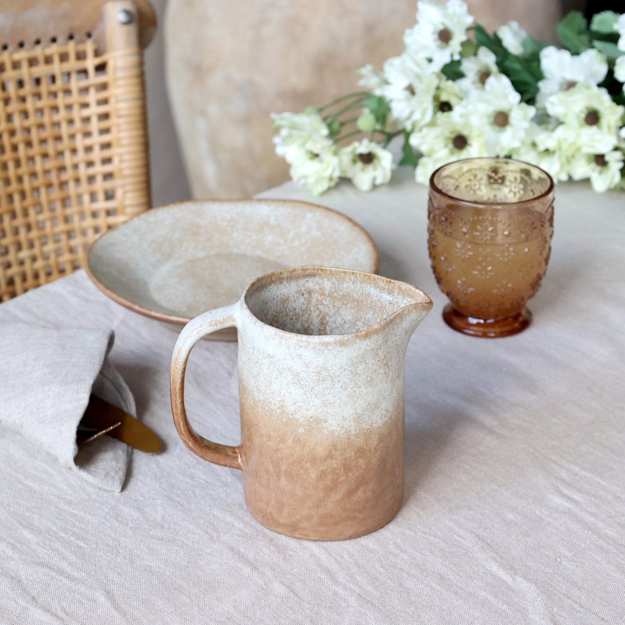 Valence milk jug in latte colour displayed on a breakfast table with neutral colour scheme