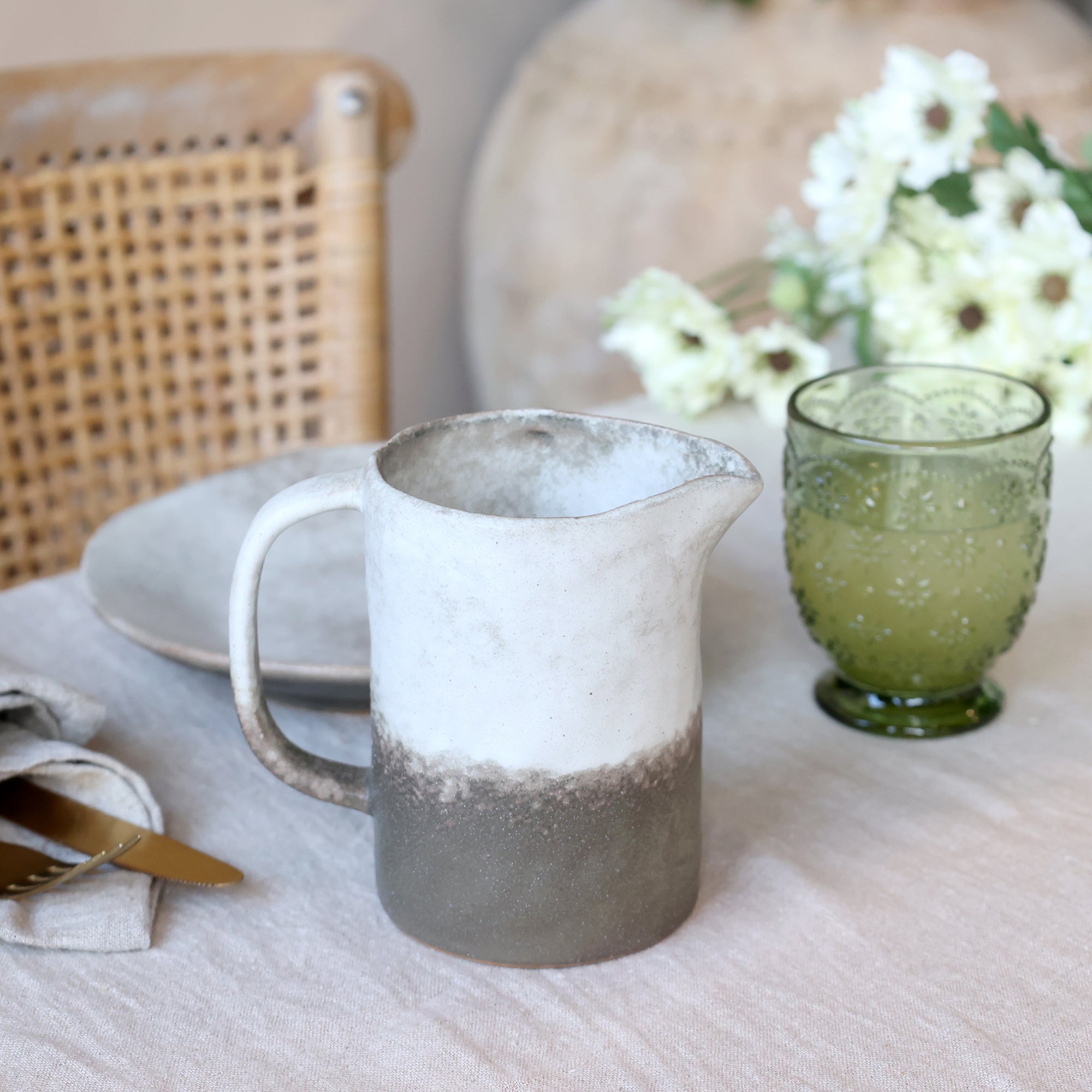 Valence milk jug in walnut colour displayed on a breakfast table with a neutral table cloth