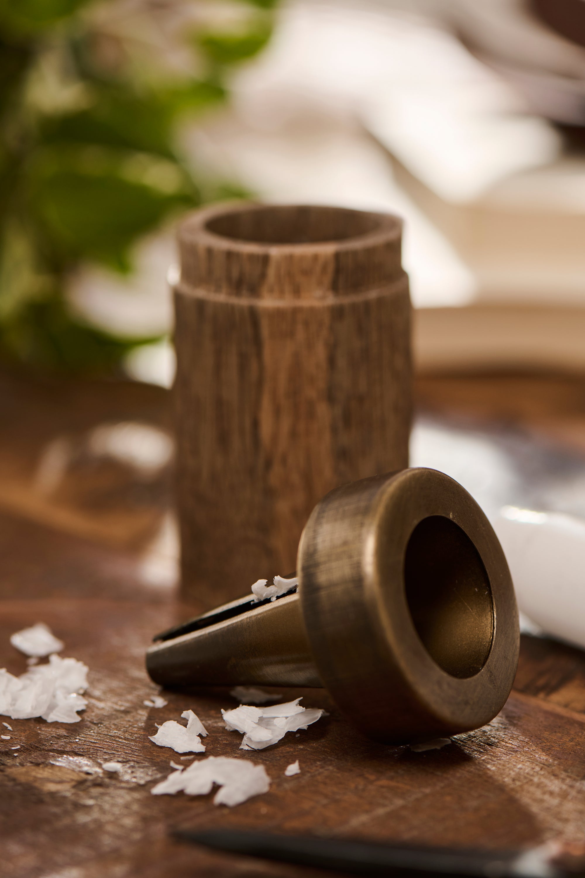 wooden candle sharpener dismantled to show candle wax shavings inside